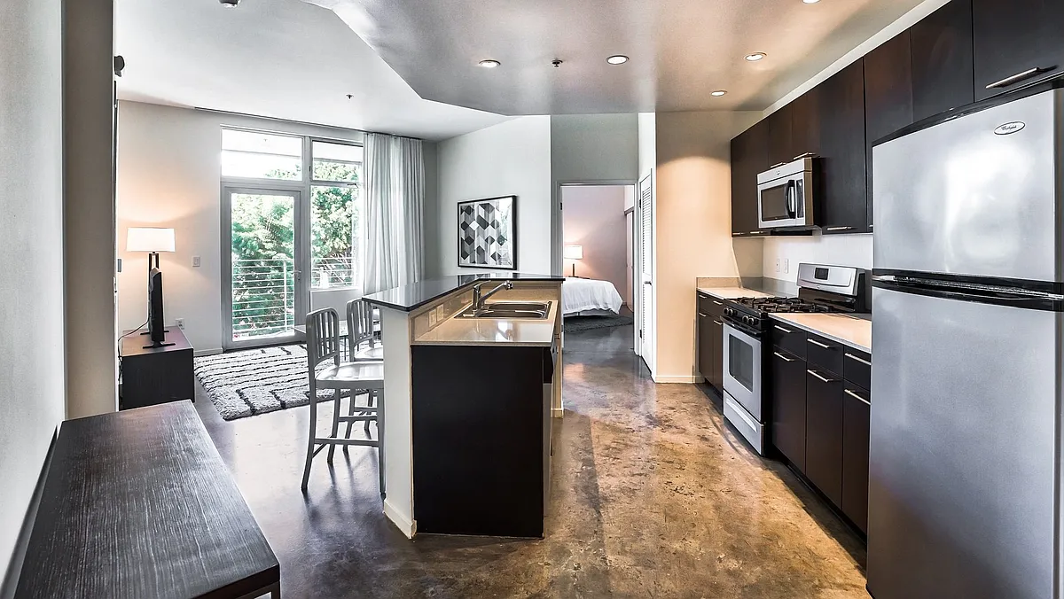 Photo 1 of 62 - sunset + vine - Los Angeles, CA Polished concrete floors in select apartment homes - sunset + vine