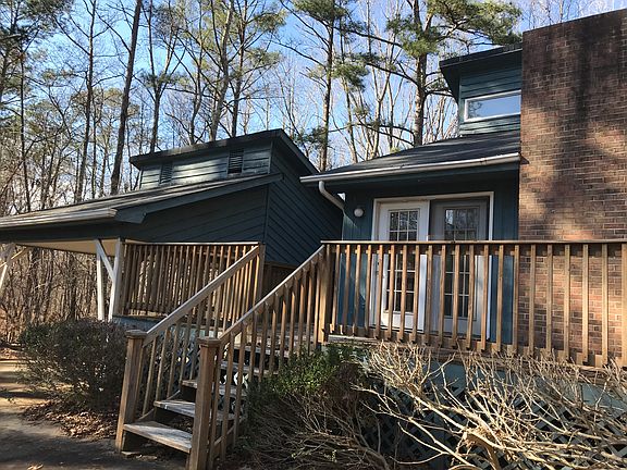 FRONT WITH EXPANSIVE DECK