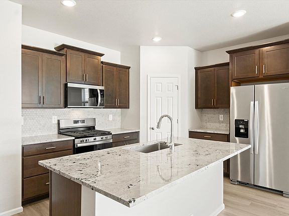 The Emerald Floorplan interior image taken at a Meritage Homes community in Windsor, CO