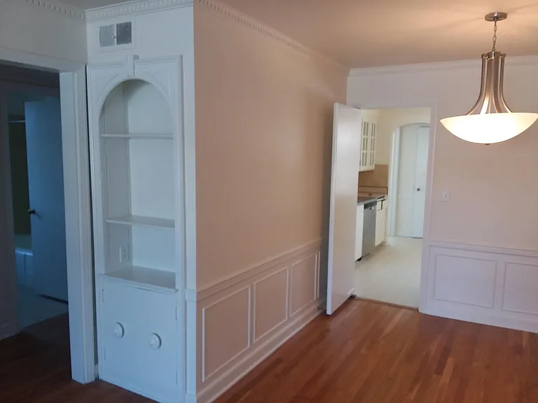 Built-in Cabinets View 1 - with view to hallway to bathroom and bedrooms