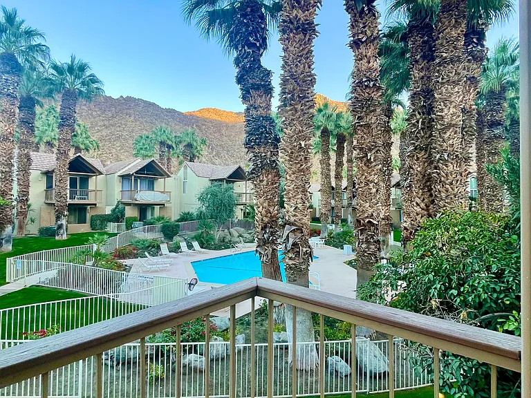 Patio view of 1 of 3 pools in the community