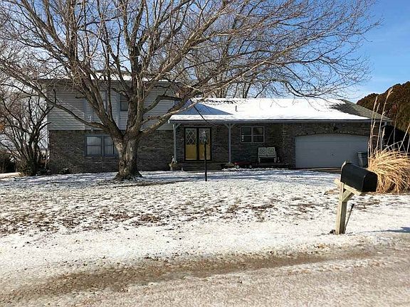 4 Bedrooms/2.5 Baths/ 2 Car Garage/ .88acre