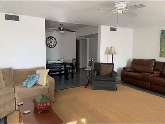 large living room looking into dining room