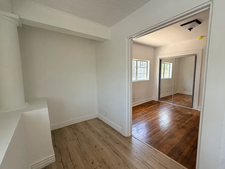 The additional space is most likely the original enclosed porch.
