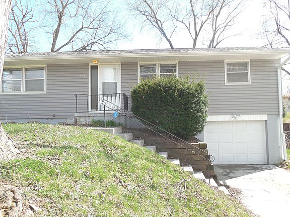 New Siding, Gutters, Roof, and Driveway