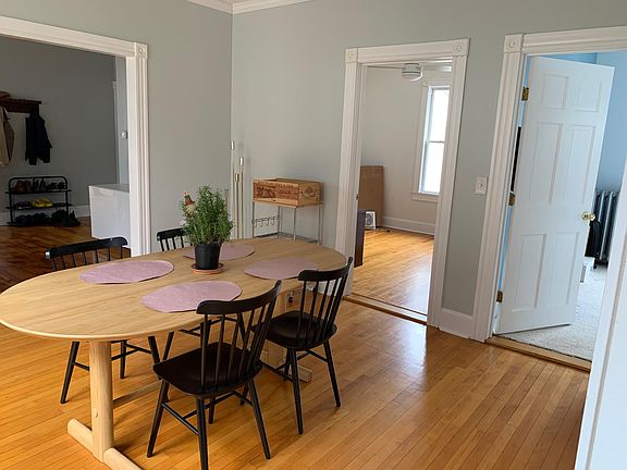 Dining room with doors to both bedrooms