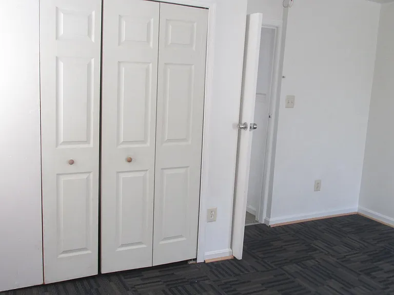 Bedroom with closet space.