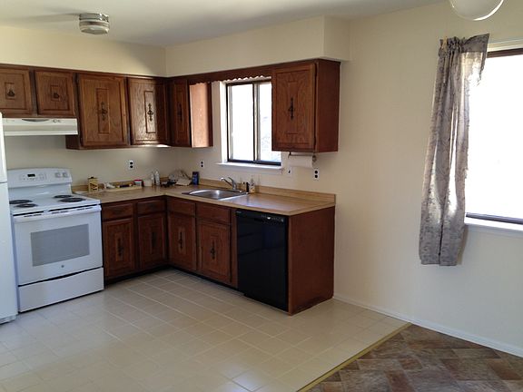 Country kitchen with large eating area.
