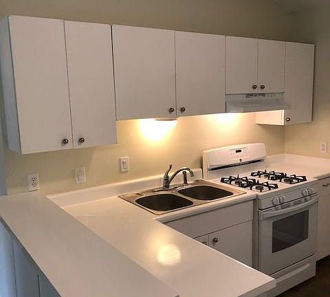 Kitchen with bar top/casual eating area