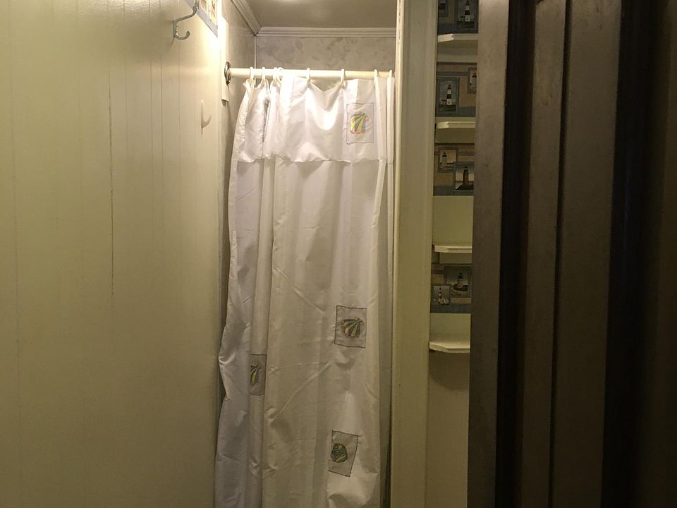 2ND BATHROOM SHOWER (POOR PHOTO; IT HAS A TOILET AND LAVATO