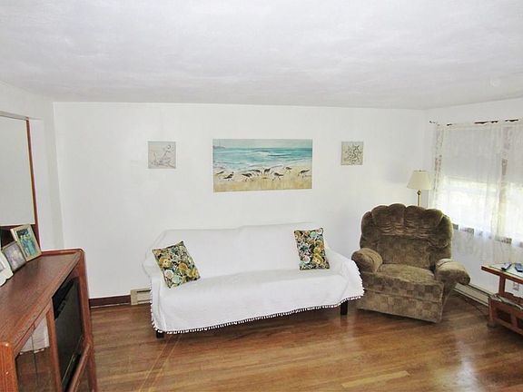 Nice Spacious Living Room With Beautiful Hardwood Floors!