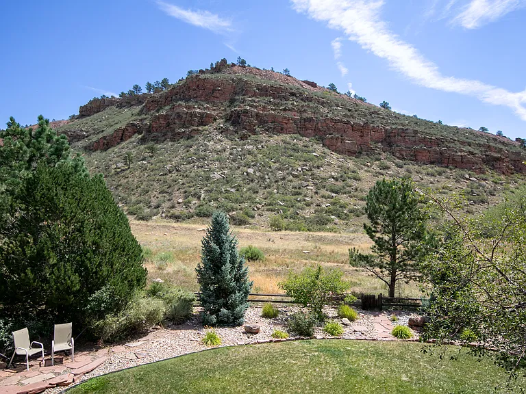 Home backs to neighborhood open space.