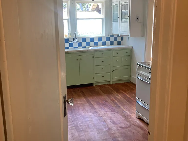 View of kitchen from hall