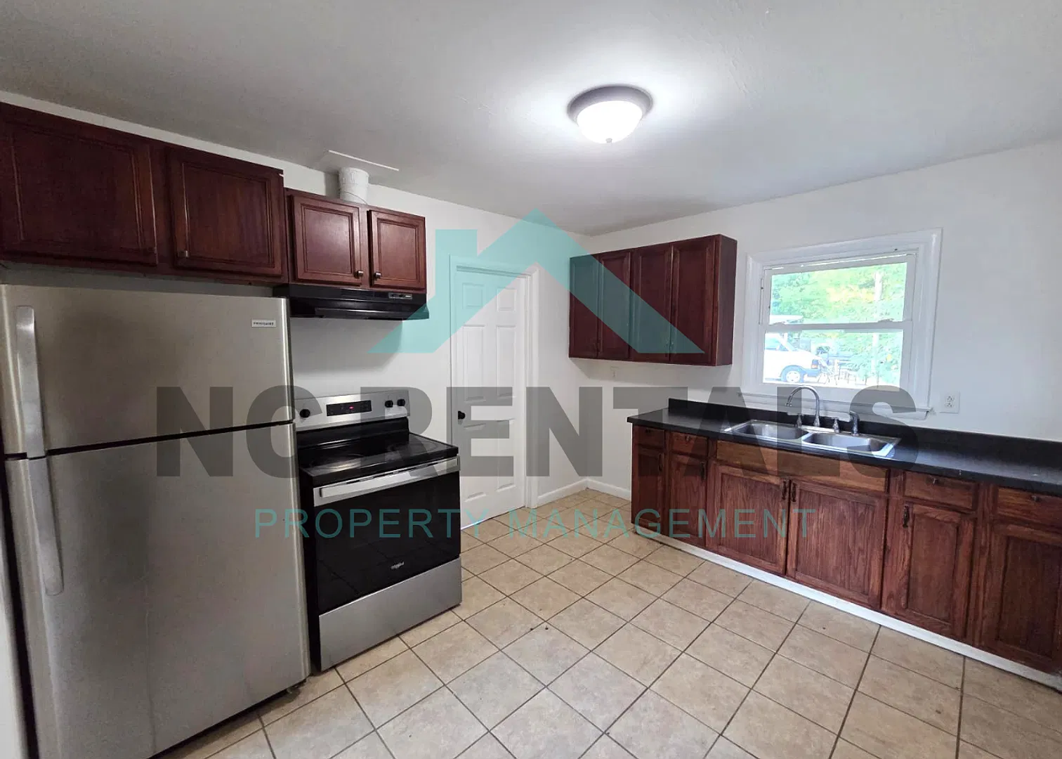 Charming $1,250 3 Bed/1.0 Bath Home in Greensboro w/ Spacious Yard & Great Layout! — Photo 4