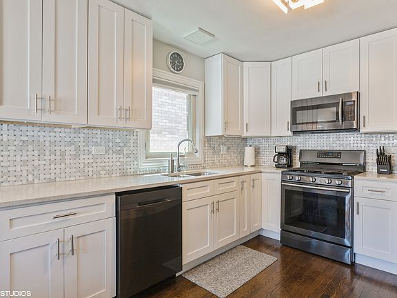 3rd image of 3217 N Ozanam Ave