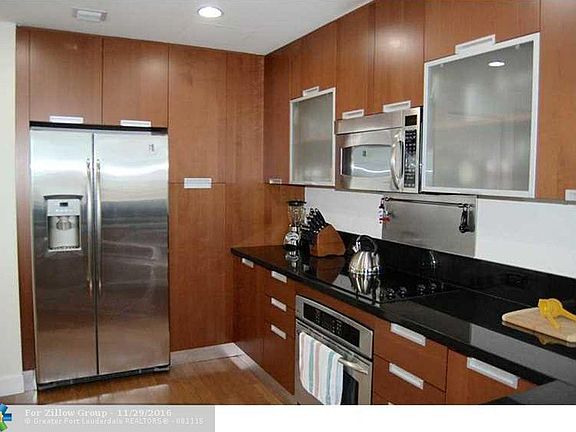 Beautiful kitchen with stainless steel appliances.