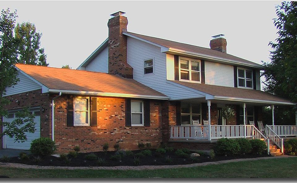 Beautiful Colonial with 3 Fireplaces & Huge Front Porch