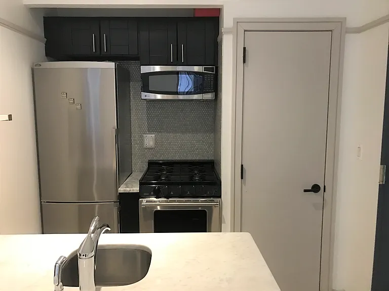 459 W 43rd St #1B — Photo 1