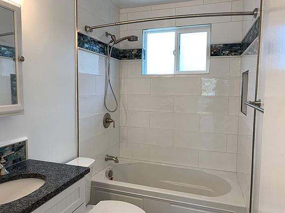 The bathroom is a sanctuary with a deep soaker tub/shower combo and lots of great shower pressure for a great bathing experience! Finished beautifully just like the kitchen.