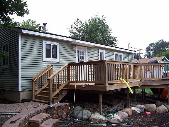 Rear Deck w/ Brick Paver & Boulder Wall