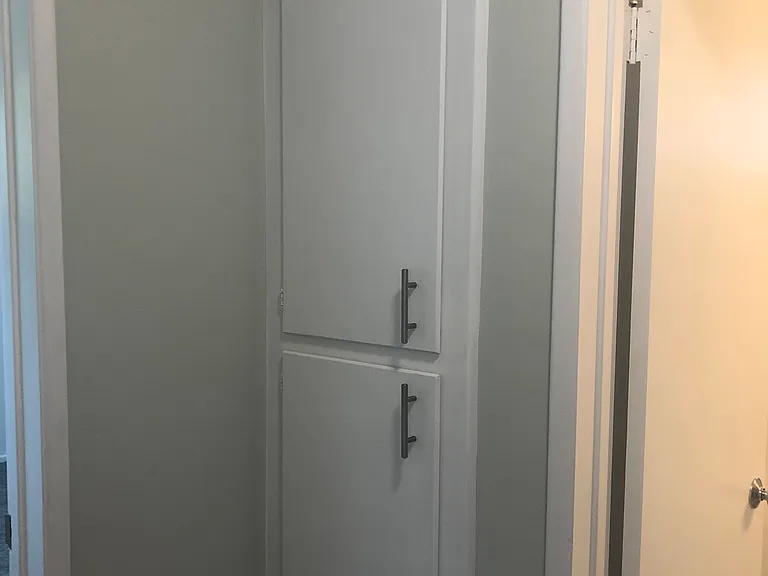 Linen storage in hallway