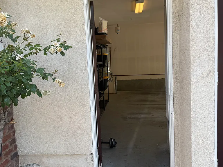 Entryway to private detached two-car garage.
