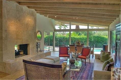LR/Dining area.  Fireplace is two sided and is located between this area and the family room.