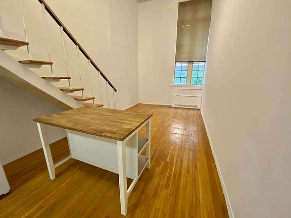 2nd image of 122 E 13th St APT 2C