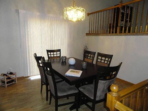 Spacious dining room with access to fenced in patio area