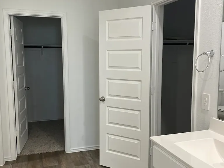 two walk in closet in master bedroom