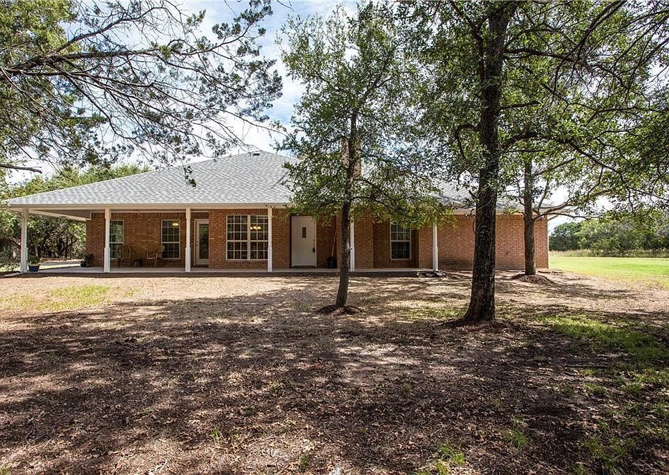 Custom built Chris Thomas Home with porches out front and back