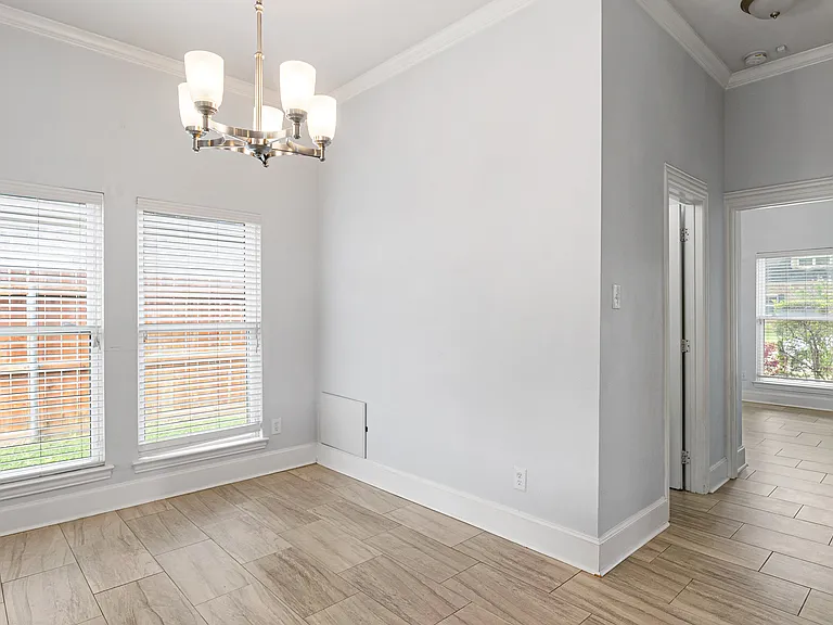 Breakfast nook and hallway to secondary bedrooms