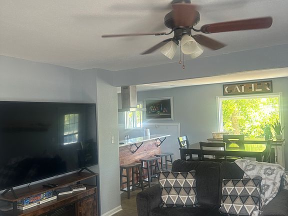 Great room area--living room, dining area, and kitchen off to the back.