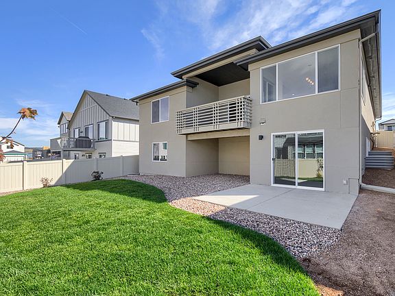 Walk-Out Rear Photo representing home to be built and may demonstrate optional features