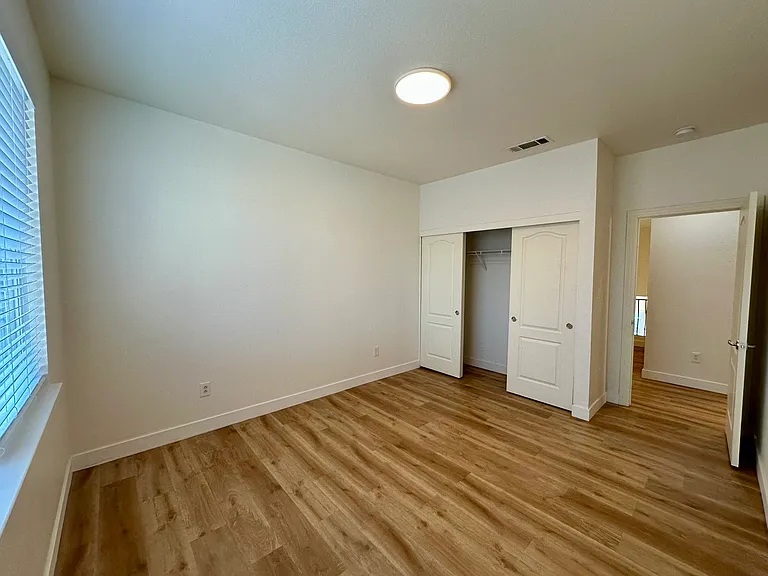 Upstairs: 
Bedroom 2 with Closet