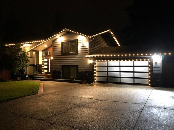 Front exterior view in winter (Christmas lights included!)