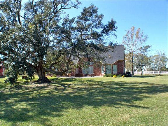  Mature trees accent the landscape.