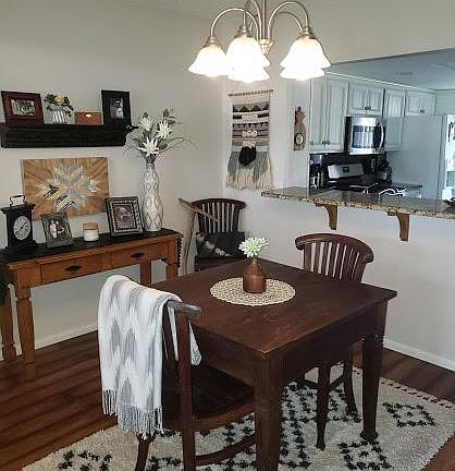 Dining Room with bar seating access to kitchen