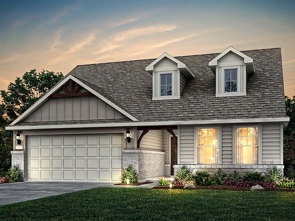 Exterior N with stone accents and a 2-car garage