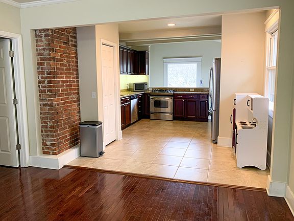 Main floor view of dining room and in to kitchen