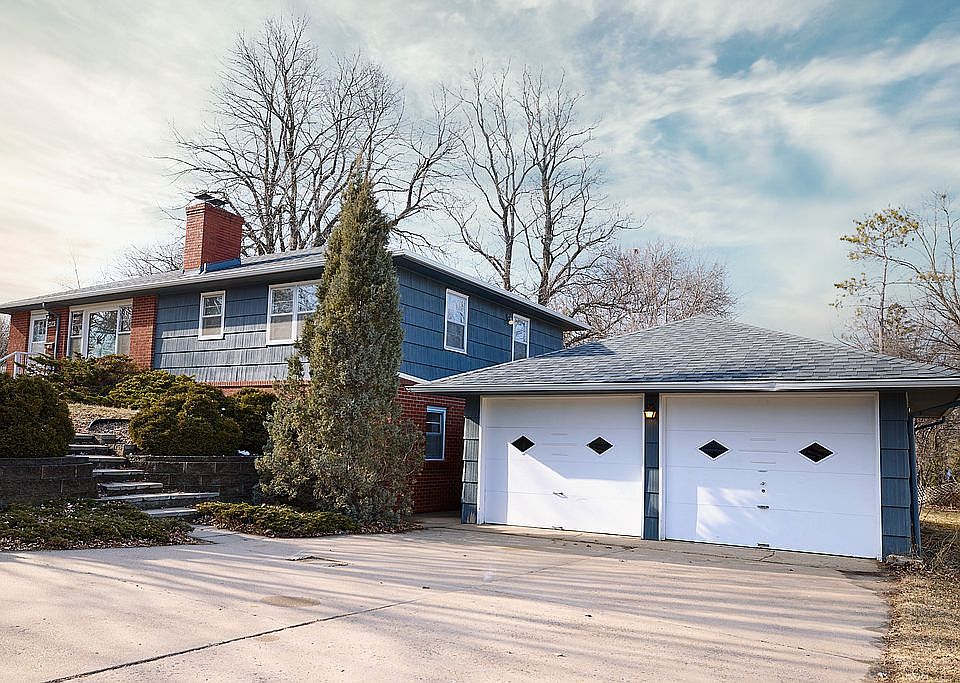 Exterior front with garage