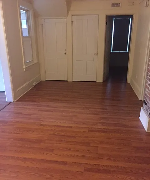 Living room space seen from bathroom door