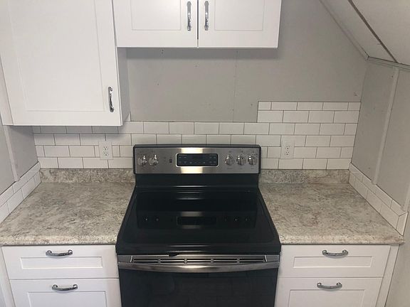 New stainless steel appliances, new cabinets, new counters, new backsplash, new sink and fresh paint!