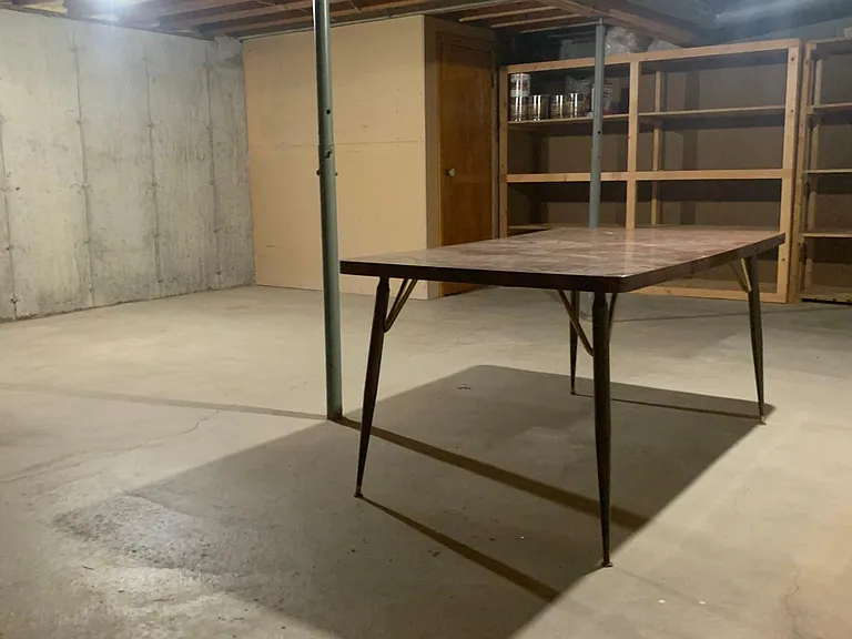 Could be a pool table room, throw in some rugs for a toy room, or have all the storage you could possibly use