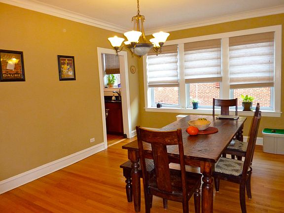 Dining room, freshly repainted in neutral color.