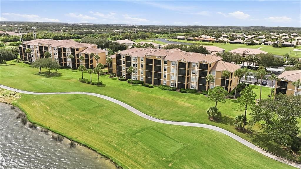 8309 GRAND ESTUARY TRAIL #306 — River Strand Golf & Country Club