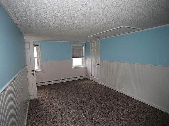 Second Bedroom with closet, pull-down stair to second attic