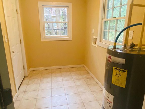 Laundry room with entry from front carport. *Washer & Dryer are provided.