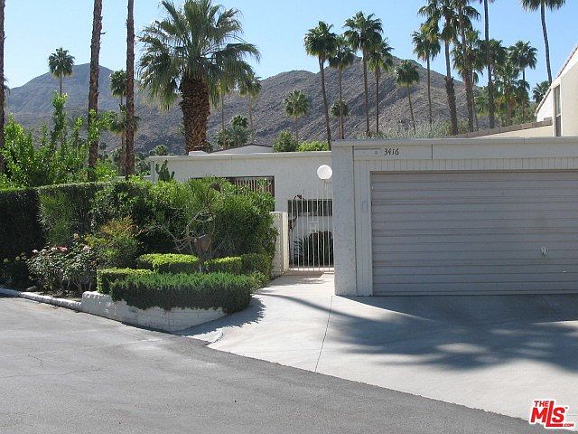 Front entry of condo and garage