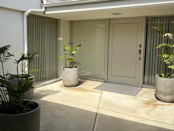 Private courtyard with floor to ceiling windows for tons of natural light